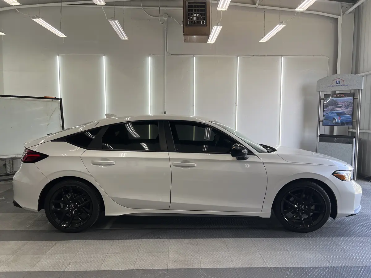 White Honda Civic after Avery Dennison Encore carbon window tint (view 2)