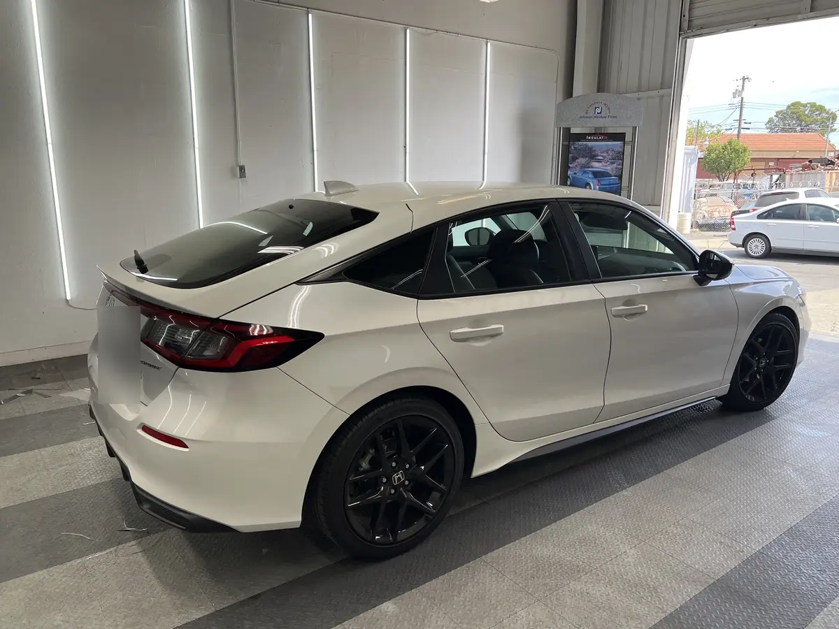 White Honda Civic before window tinting, factory glass (view 3)