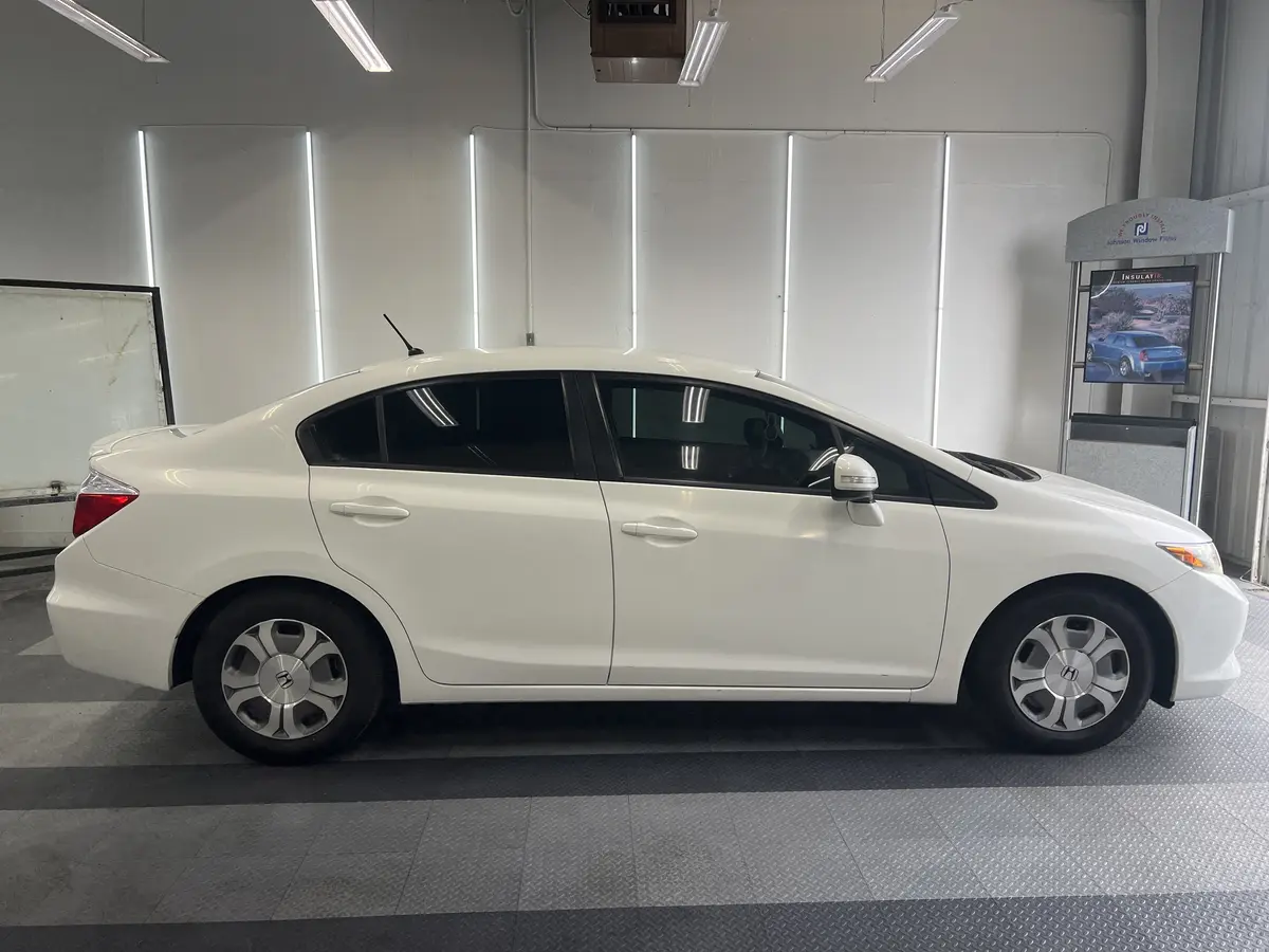 White Honda Civic after Avery Dennison Encore carbon window tint (view 3)