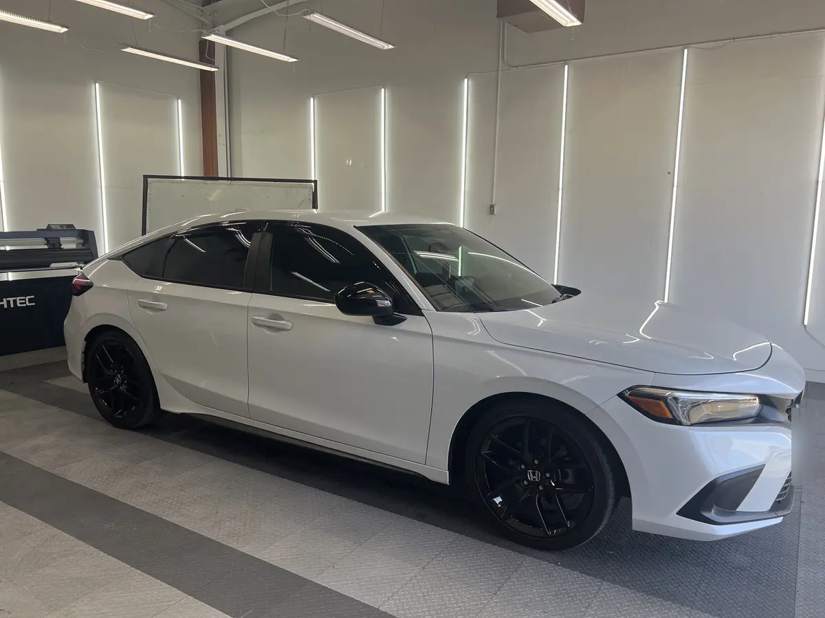White Honda Civic after Avery Dennison Encore Supreme ceramic window tint (view 1)