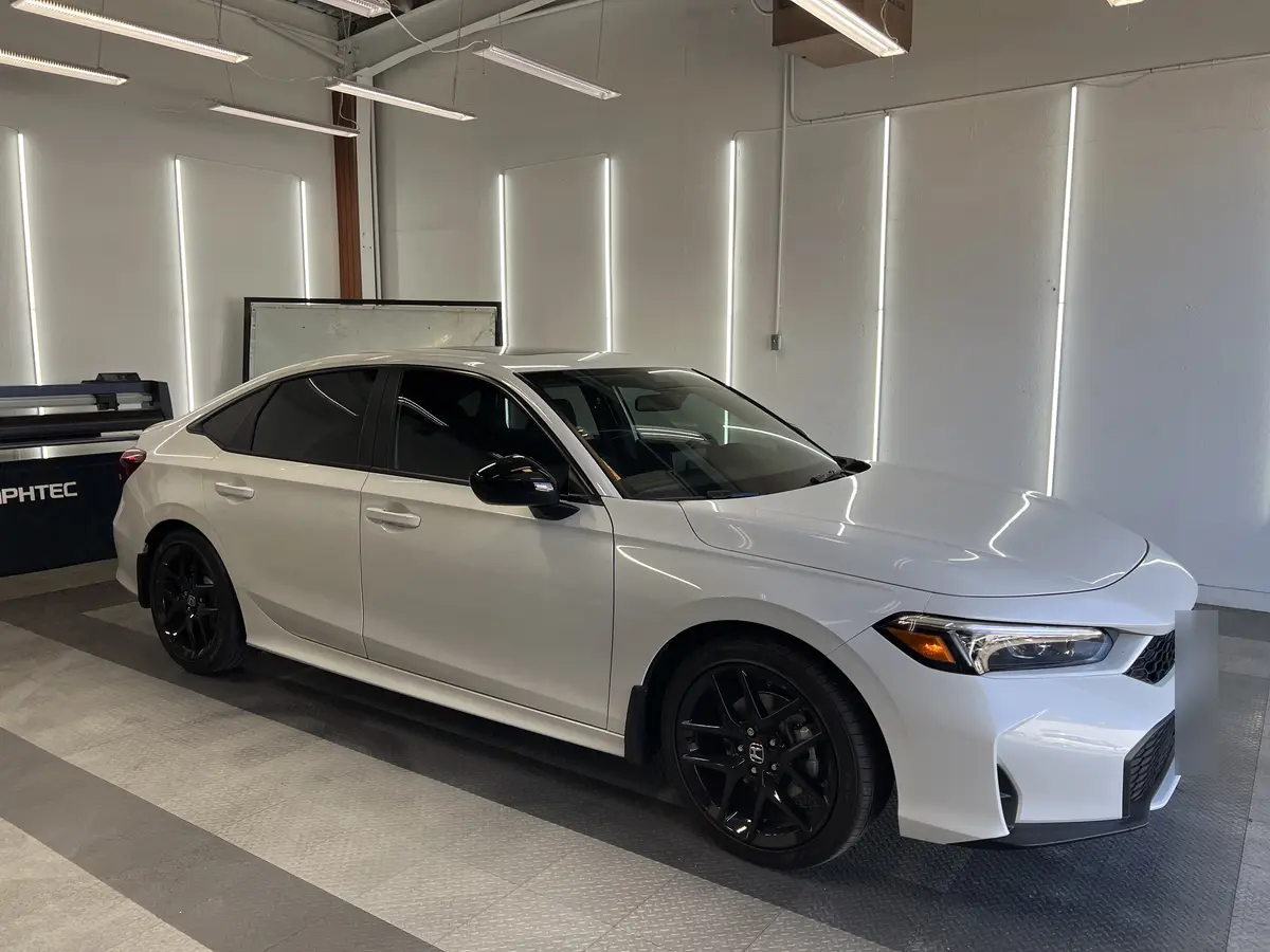 White Honda Civic after Avery Dennison Encore Supreme ceramic window tint (view 1)