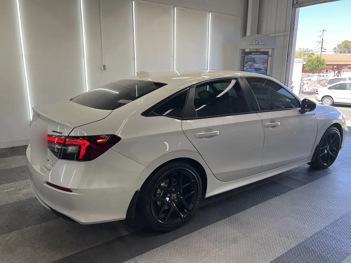 White Honda Civic after Avery Dennison Encore Supreme ceramic window tint (view 3)