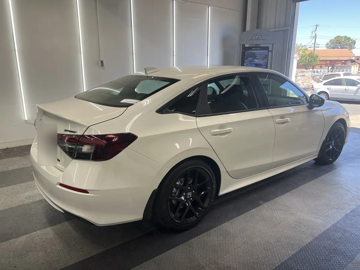 White Honda Civic before window tinting, factory glass (view 3)