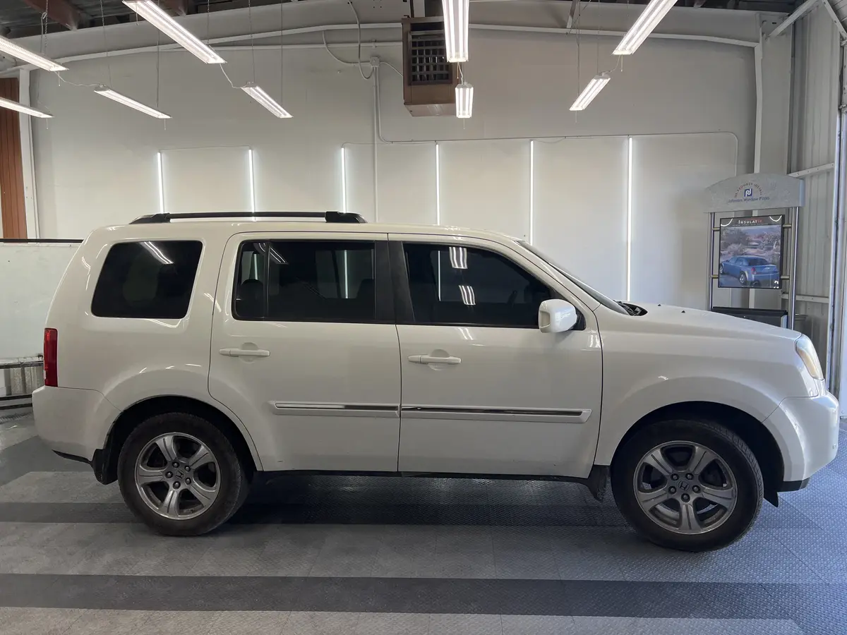 White Honda Pilot after Avery Dennison Encore Supreme IR ir ceramic window tint (view 1)