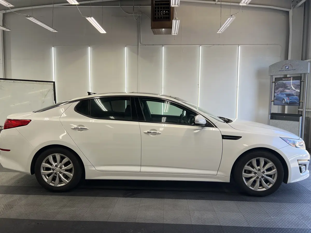 White Kia Optima after Avery Dennison Encore Supreme ceramic window tint (view 2)