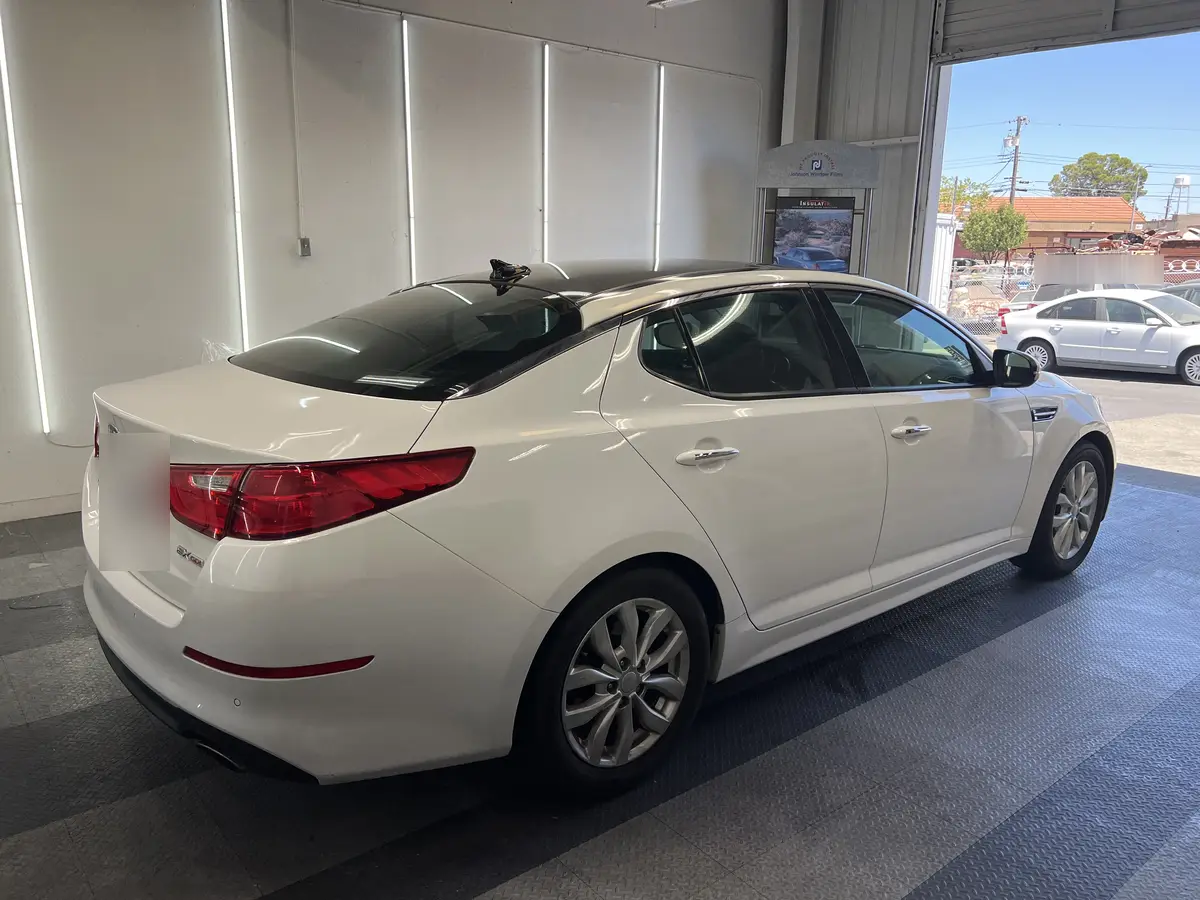 White Kia Optima after Avery Dennison Encore Supreme ceramic window tint (view 3)