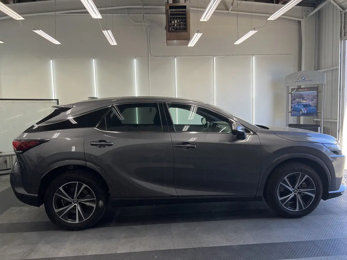 Gray Lexus RX before window tinting, factory glass (view 2)