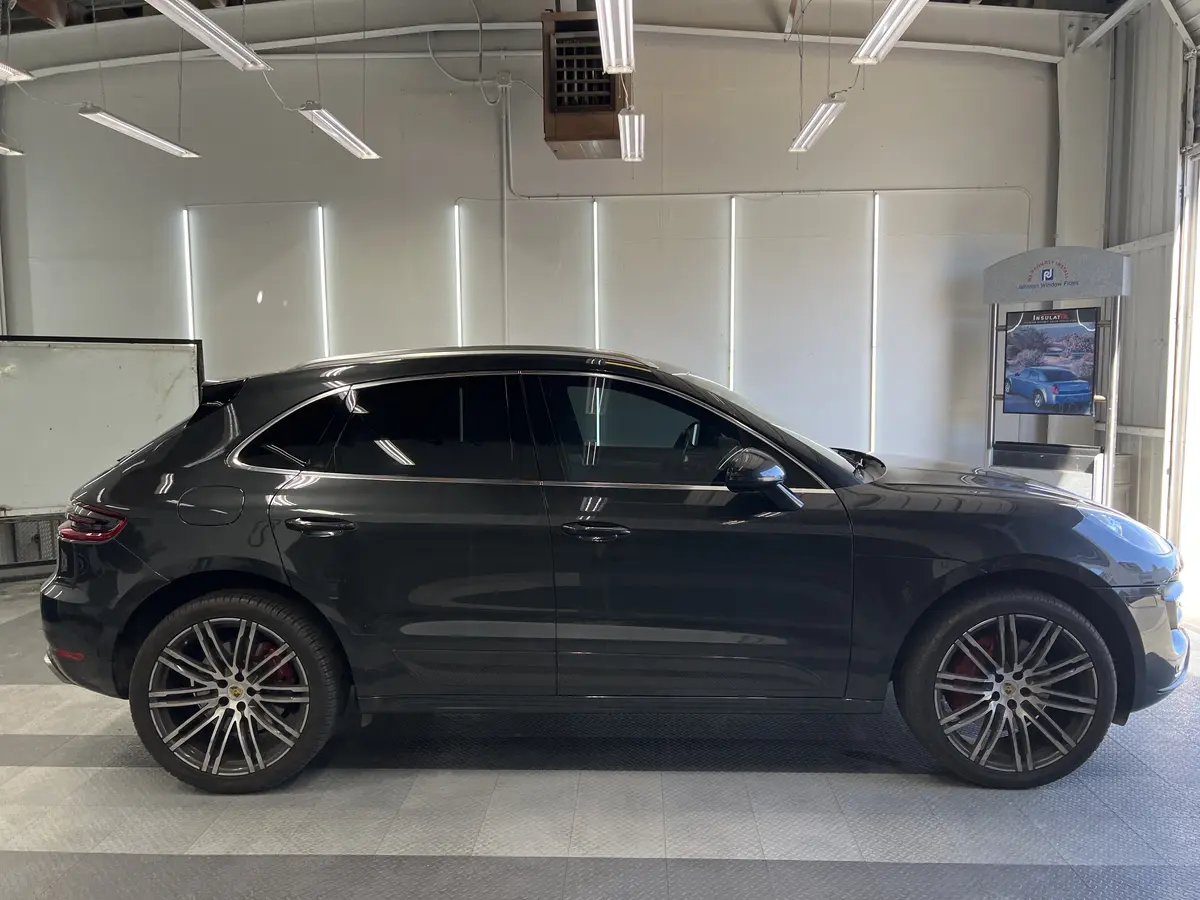 Gray Porsche Macan after Avery Dennison Encore Supreme ceramic window tint (view 2)