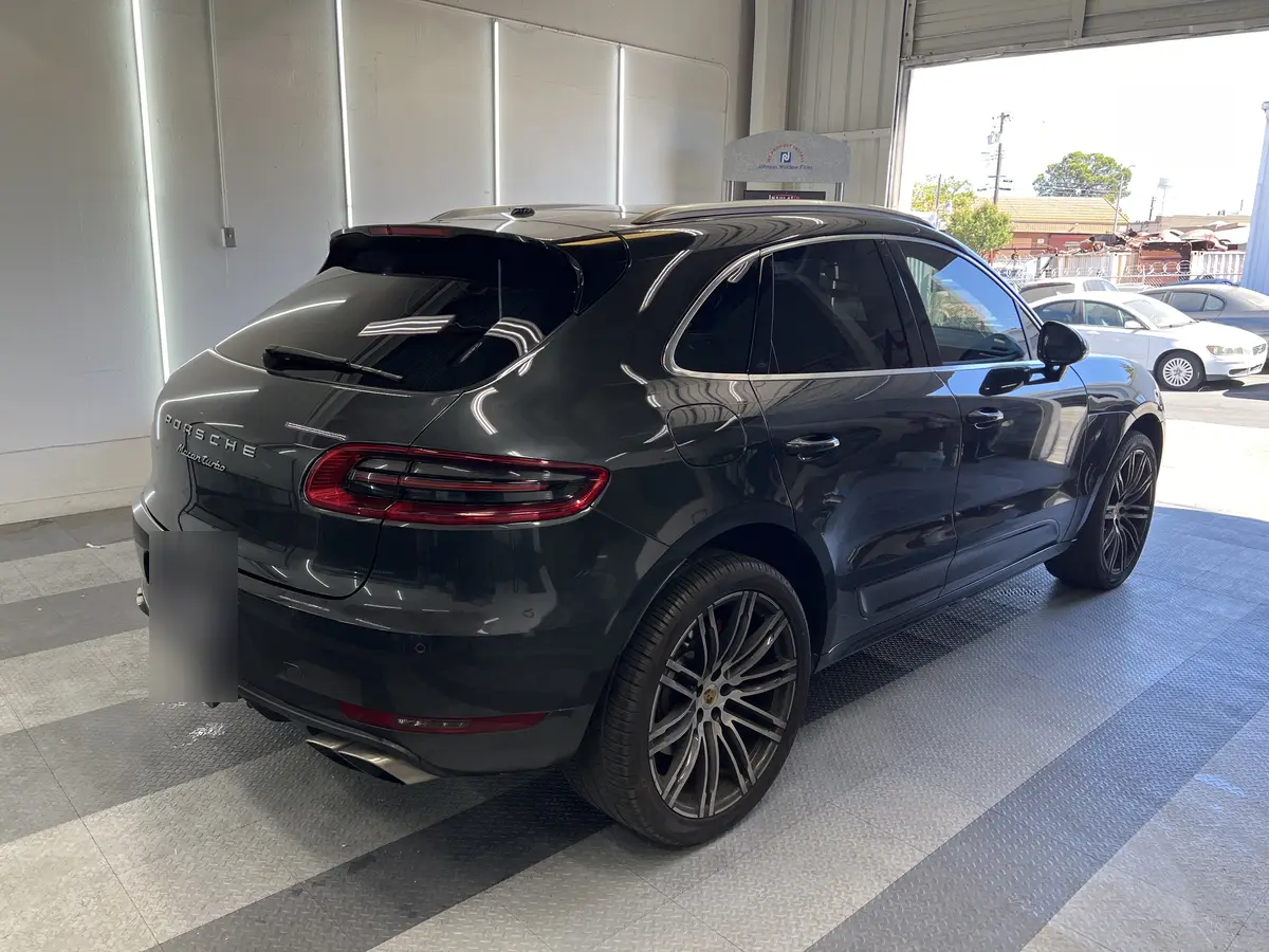 Gray Porsche Macan after Avery Dennison Encore Supreme ceramic window tint (view 3)
