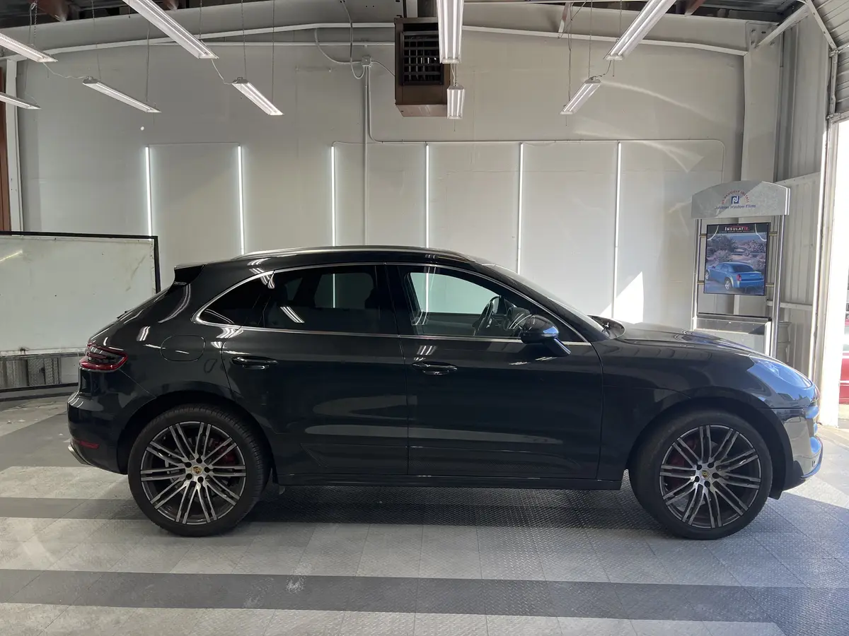 Gray Porsche Macan before window tinting, factory glass (view 1)