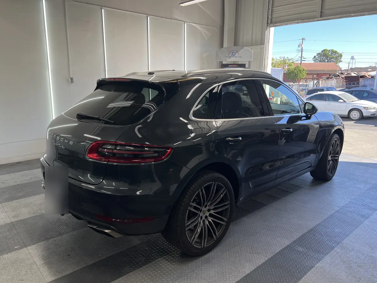 Gray Porsche Macan before window tinting, factory glass (view 3)