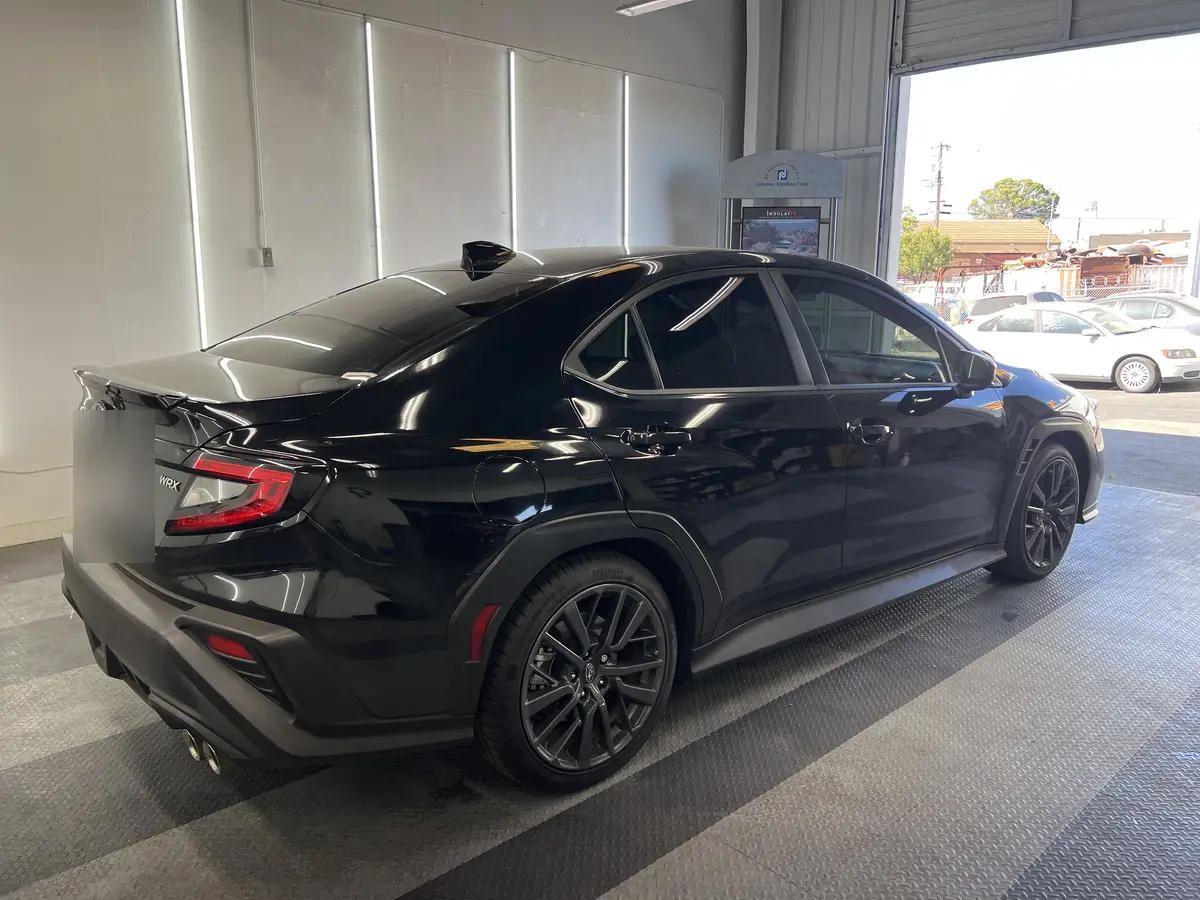Black Subaru WRX after Avery Dennison Encore Supreme ceramic window tint (view 2)