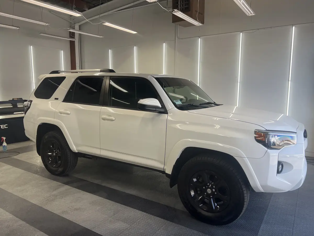 White Toyota 4Runner after Avery Dennison Encore carbon window tint (view 1)