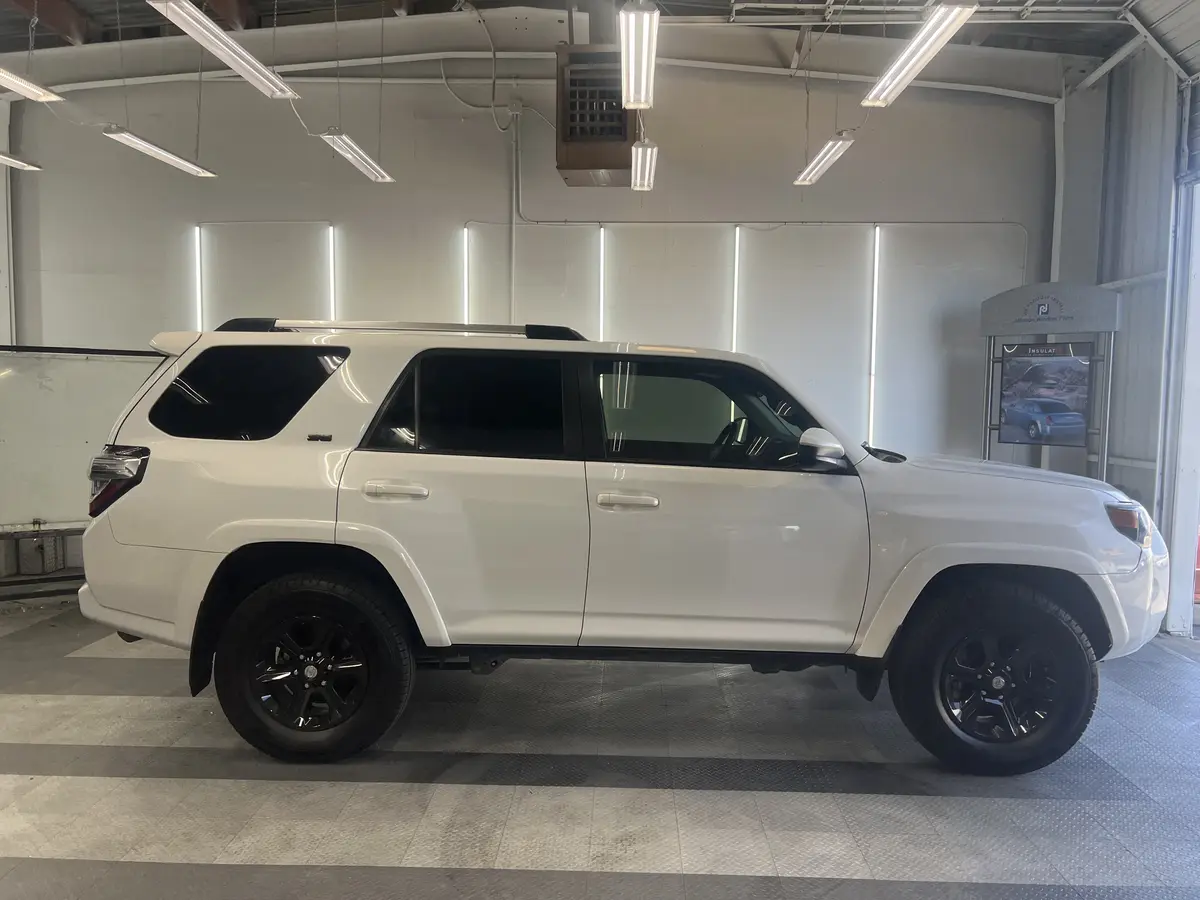 White Toyota 4Runner after Avery Dennison Encore carbon window tint (view 2)