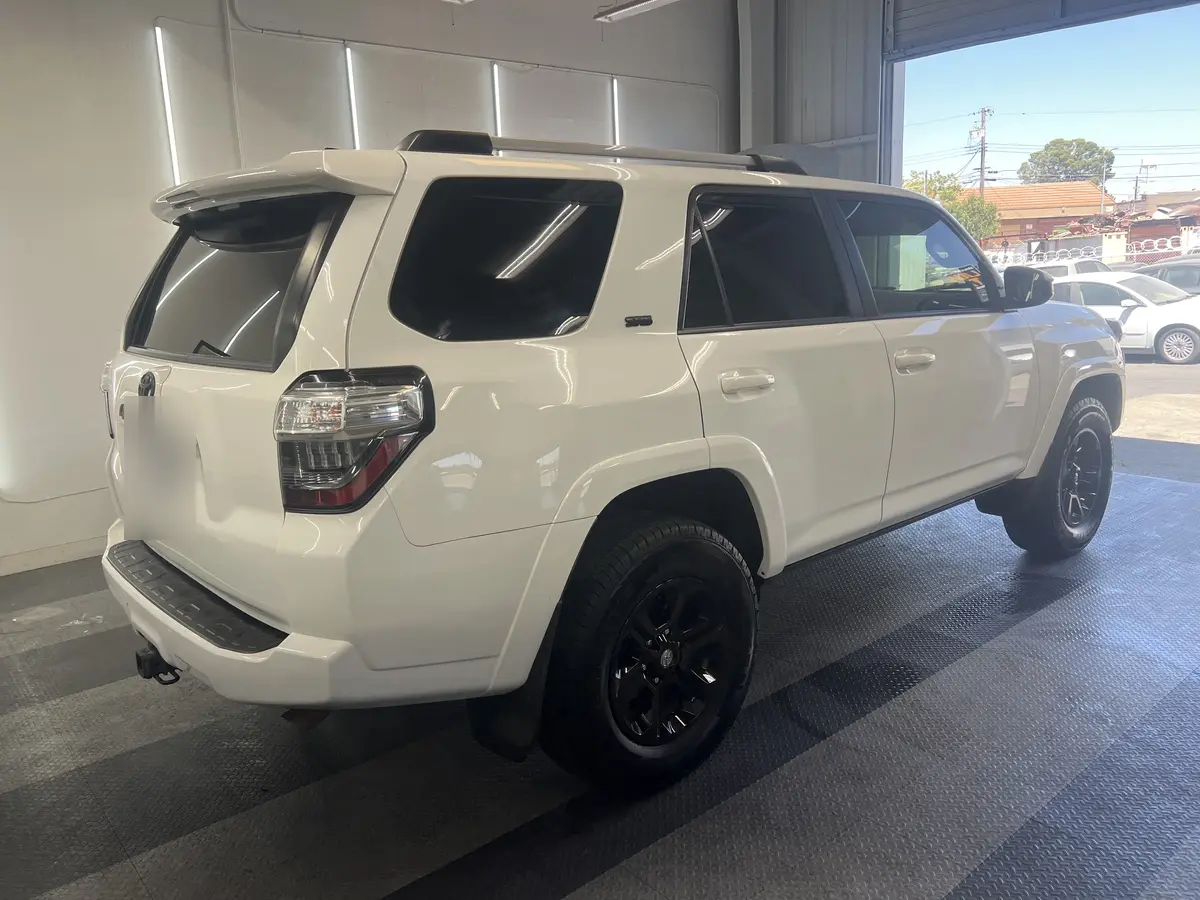 White Toyota 4Runner after Avery Dennison Encore carbon window tint (view 3)