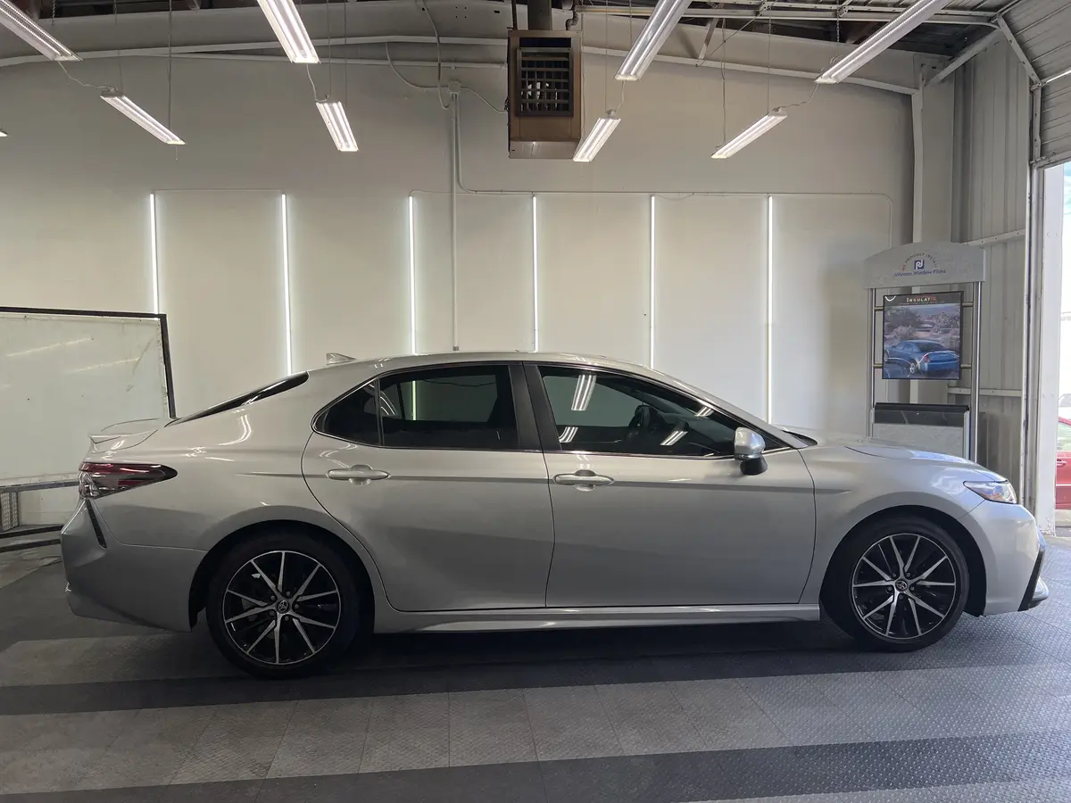 Silver Toyota Camry after Avery Dennison Encore carbon window tint (view 3)