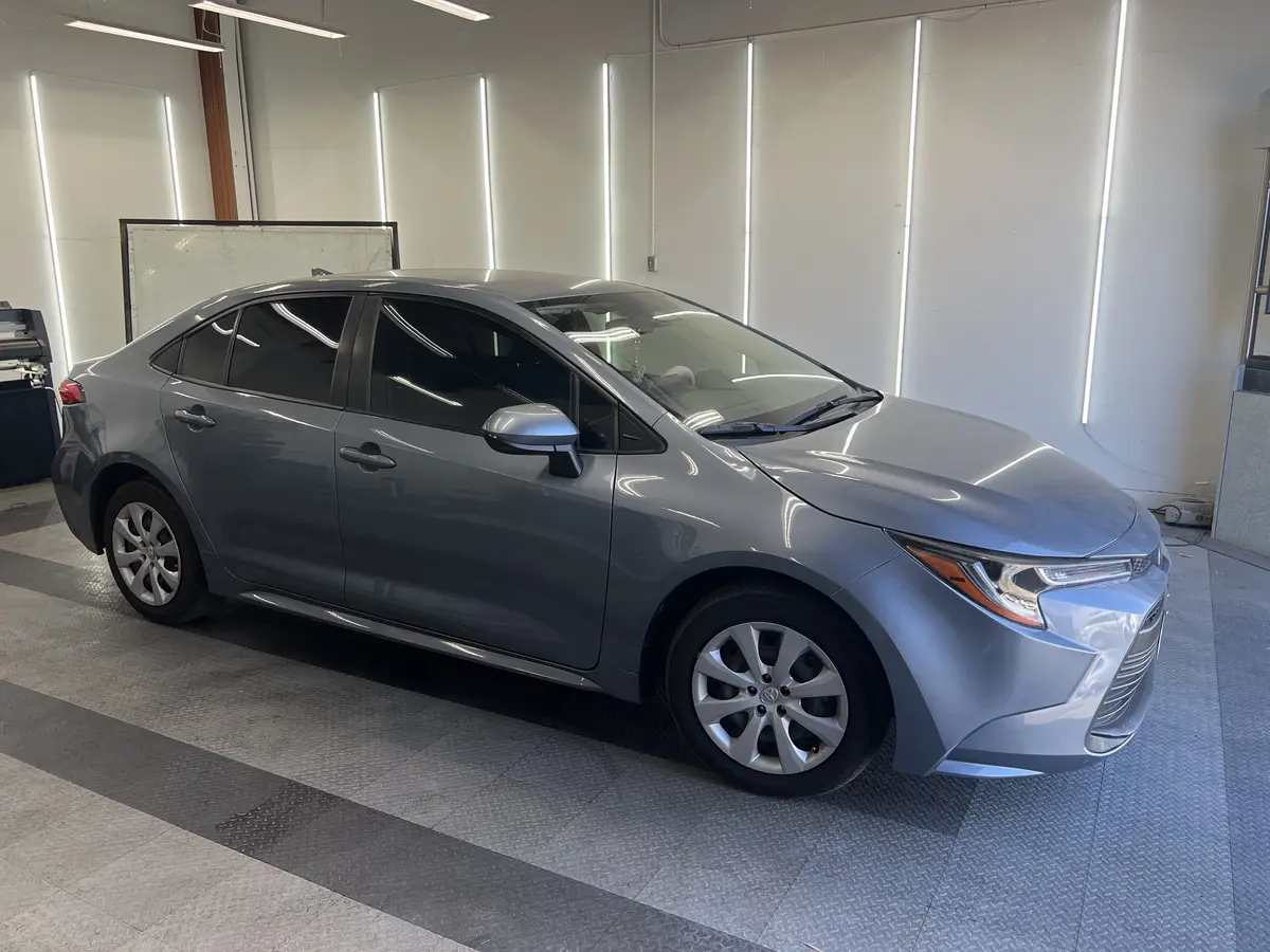 Gray Toyota Corolla after Avery Dennison Encore Supreme ceramic window tint (view 2)