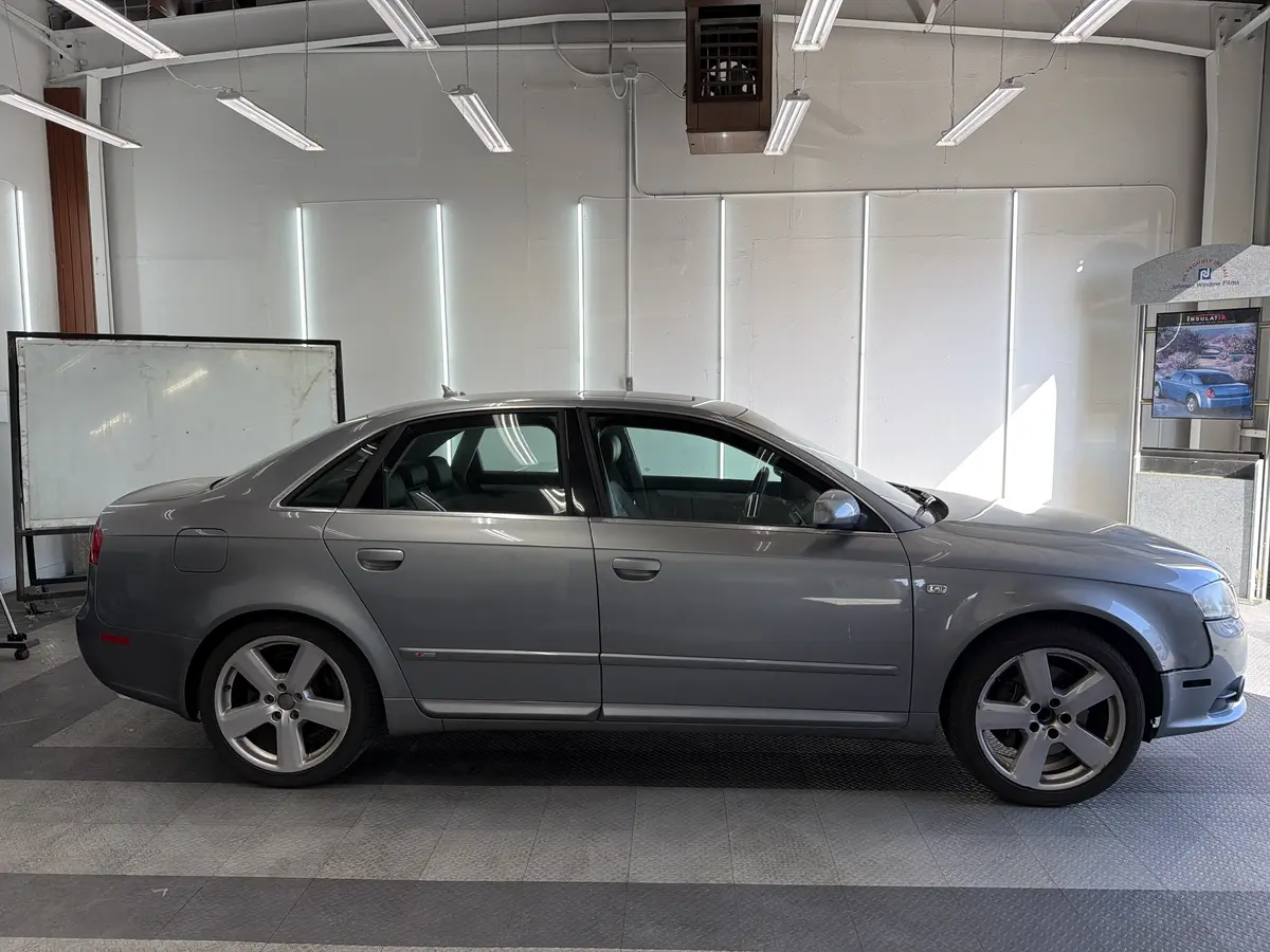Silver Audi A4 before window tinting, factory glass (view 2)