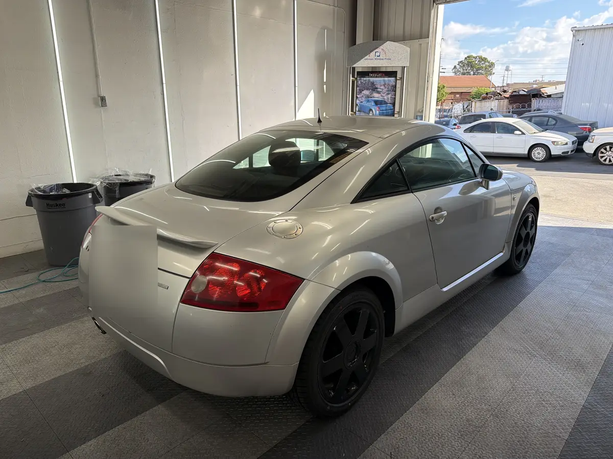Silver Audi TT before window tinting, factory glass (view 2)