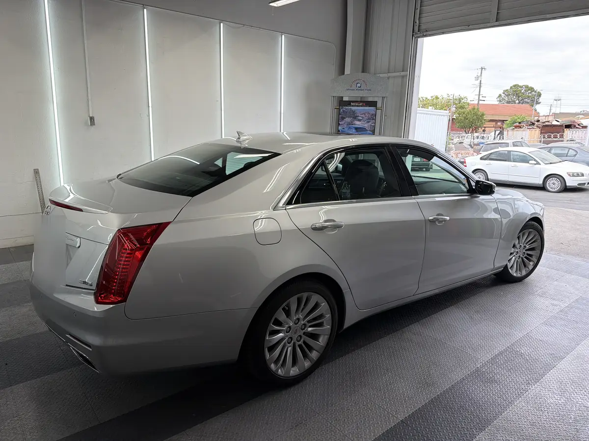 Silver Cadillac CTS before window tinting, factory glass (view 3)
