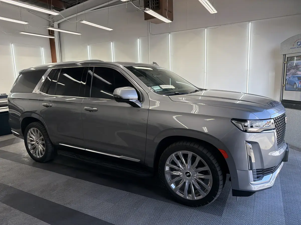 Gray Cadillac Escalade after Avery Dennison Encore Supreme ceramic window tint (view 1)
