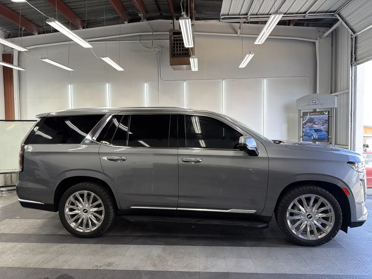 Gray Cadillac Escalade after Avery Dennison Encore Supreme ceramic window tint (view 2)