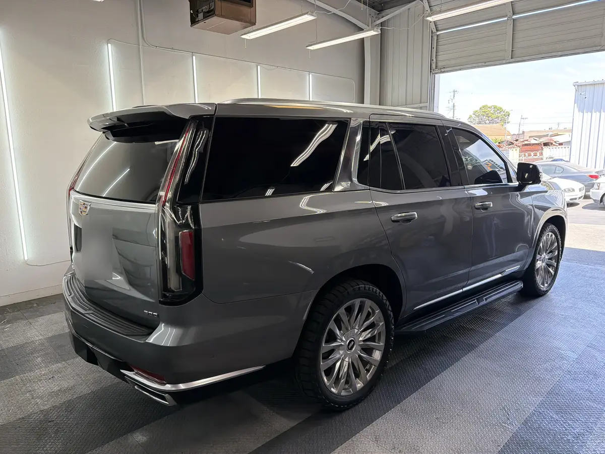 Gray Cadillac Escalade after Avery Dennison Encore Supreme ceramic window tint (view 3)