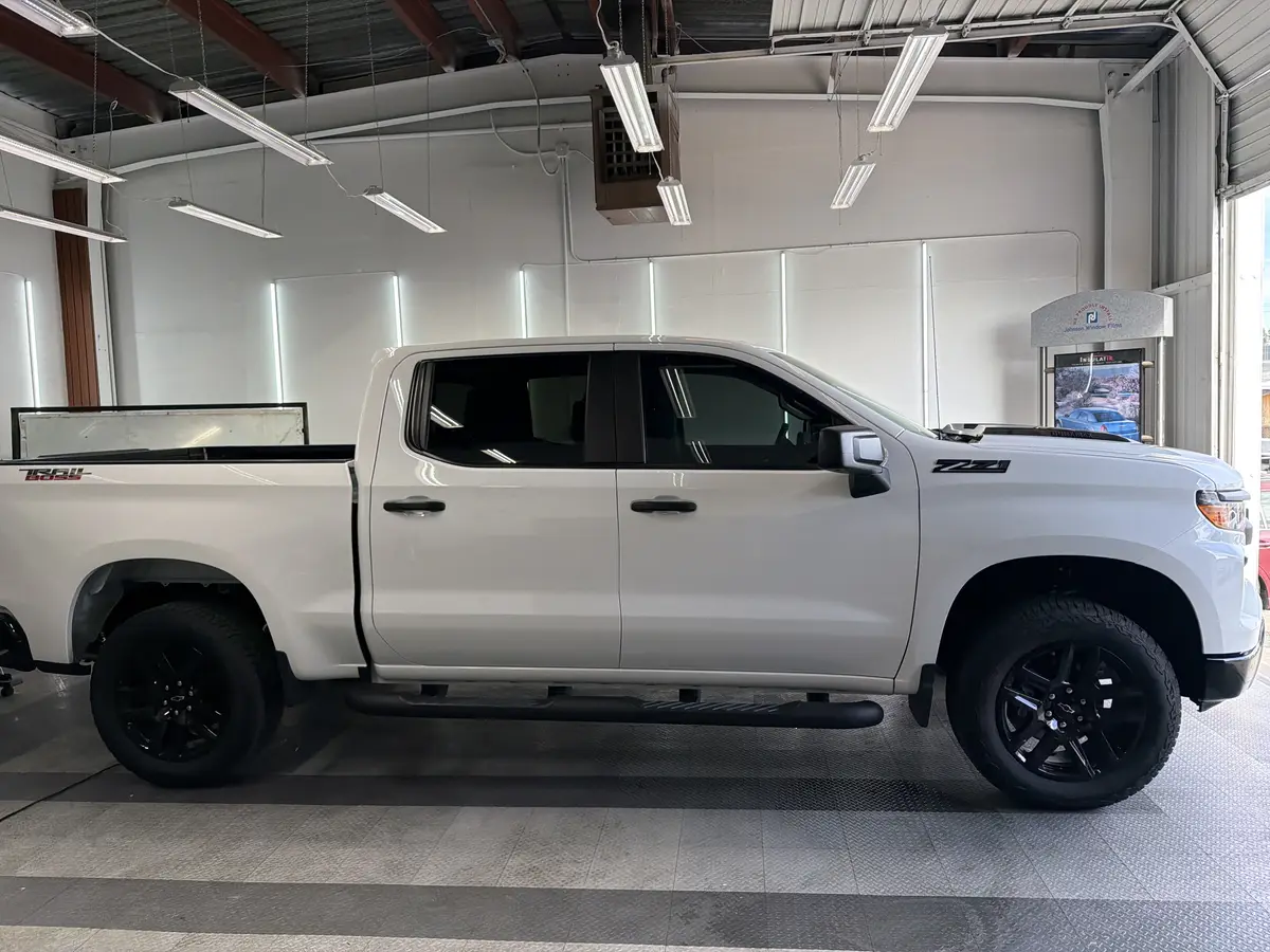 White Chevrolet Silverado after Avery Dennison Encore Supreme ceramic window tint (view 1)