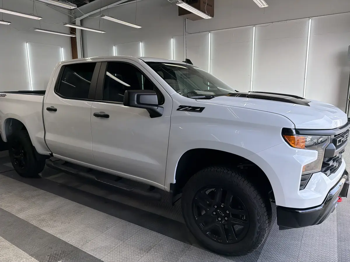 White Chevrolet Silverado after Avery Dennison Encore Supreme ceramic window tint (view 2)