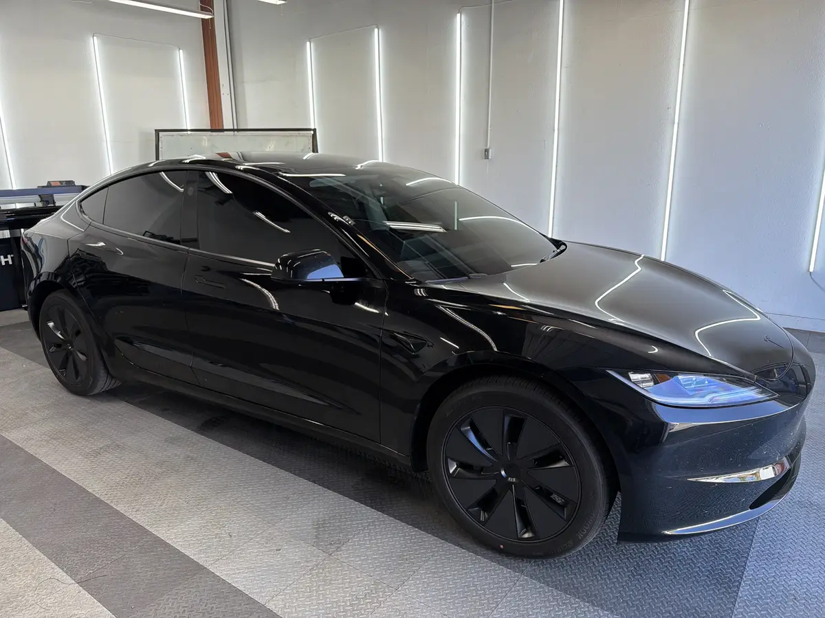 Black Tesla Model 3 after Avery Dennison Encore Supreme ceramic window tint (view 1)
