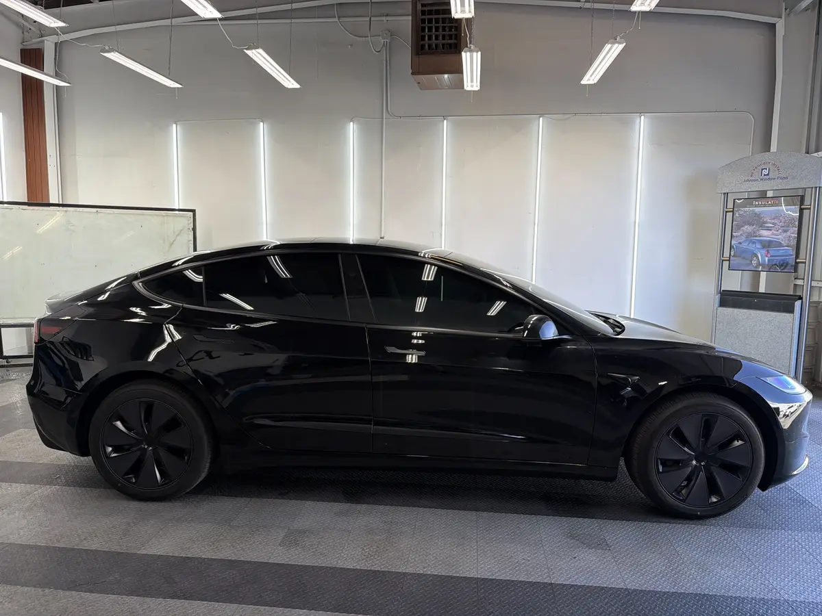 Black Tesla Model 3 after Avery Dennison Encore Supreme ceramic window tint (view 2)