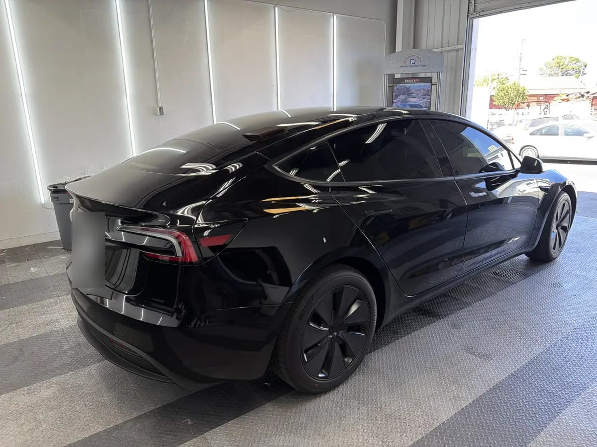 Black Tesla Model 3 after Avery Dennison Encore Supreme ceramic window tint (view 3)