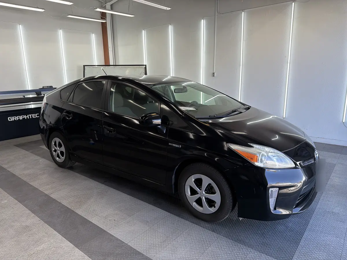 Black Toyota Prius after Avery Dennison Encore Supreme ceramic window tint (view 1)