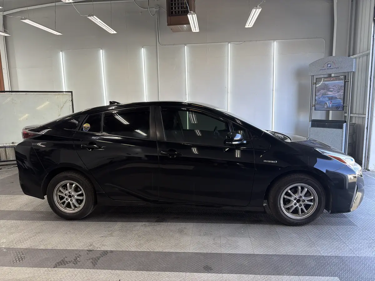 Black Toyota Prius after Avery Dennison Encore carbon window tint (view 3)