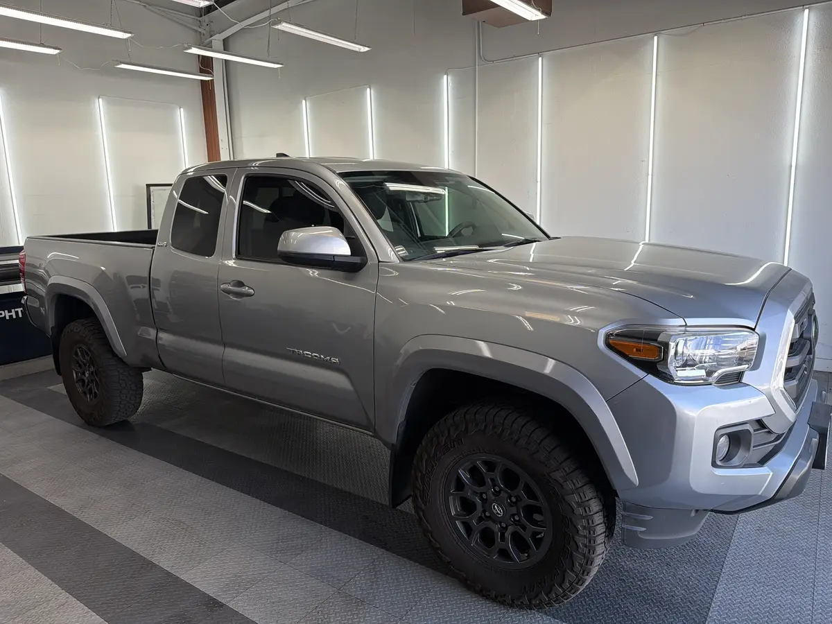 Silver Toyota Tacoma after Avery Dennison Encore Supreme ceramic window tint (view 1)