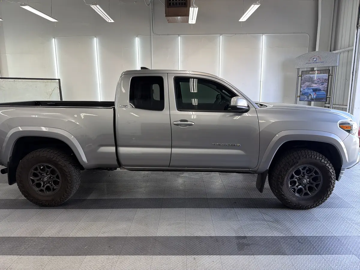 Silver Toyota Tacoma after Avery Dennison Encore Supreme ceramic window tint (view 2)