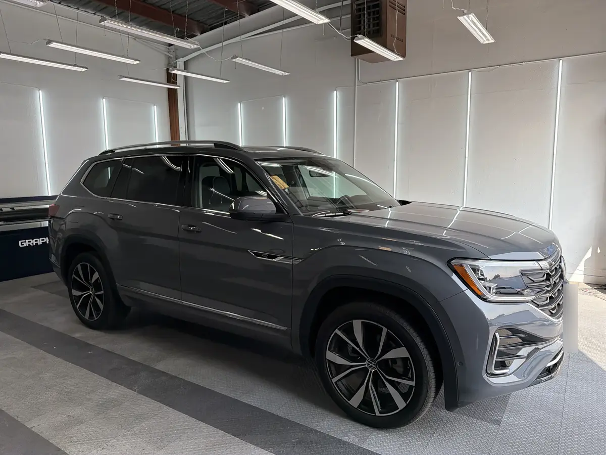 Gray Volkswagen Atlas before window tinting, factory glass (view 1)