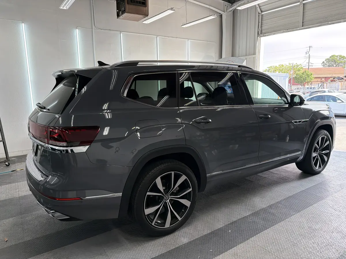Gray Volkswagen Atlas before window tinting, factory glass (view 3)