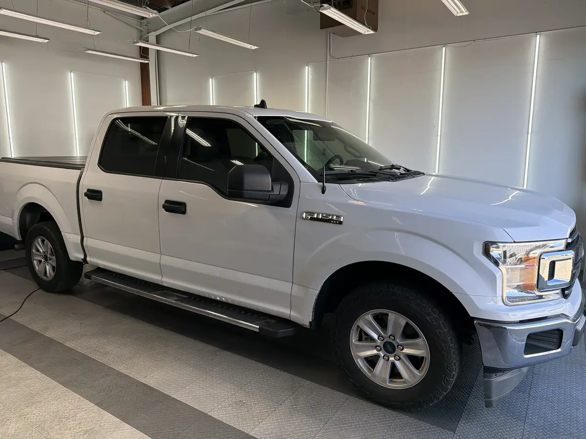Silver Ford F-150 after Avery Dennison Encore Supreme ceramic window tint (view 1)