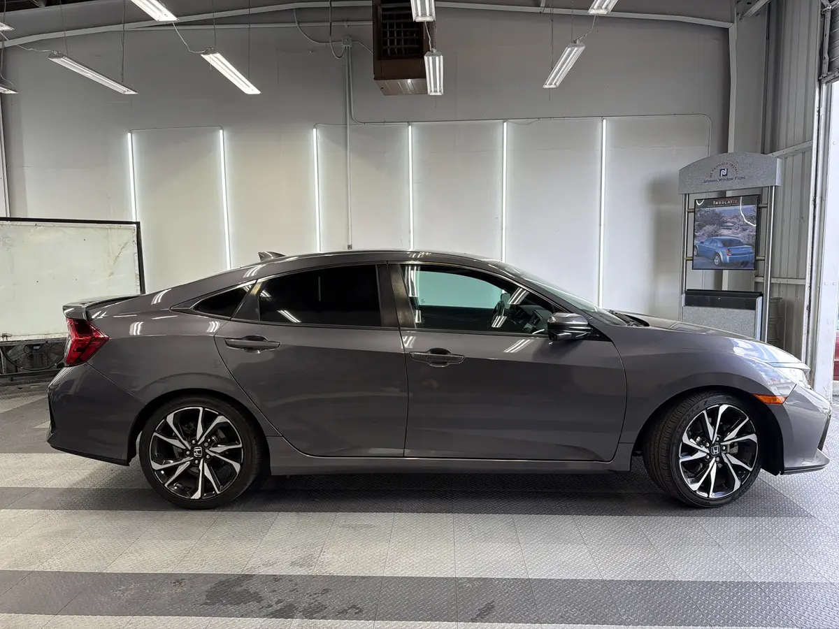 Gray Honda Civic after Avery Dennison Encore carbon window tint (view 2)