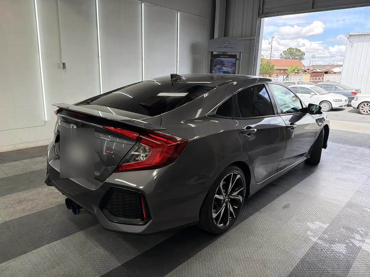 Gray Honda Civic after Avery Dennison Encore carbon window tint (view 3)