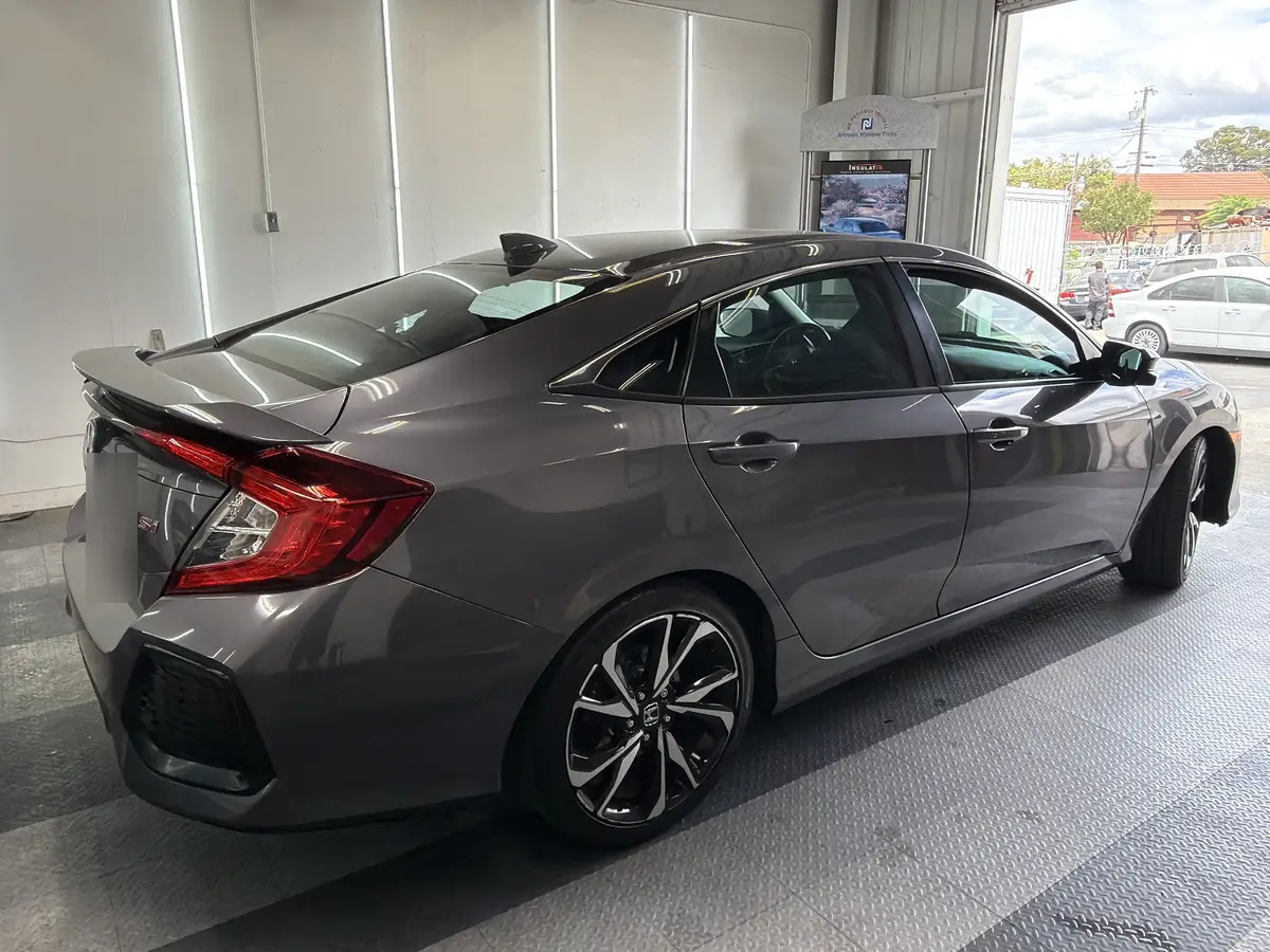 Gray Honda Civic at Quality Window Tinting, carbon window tint job (photo 1)