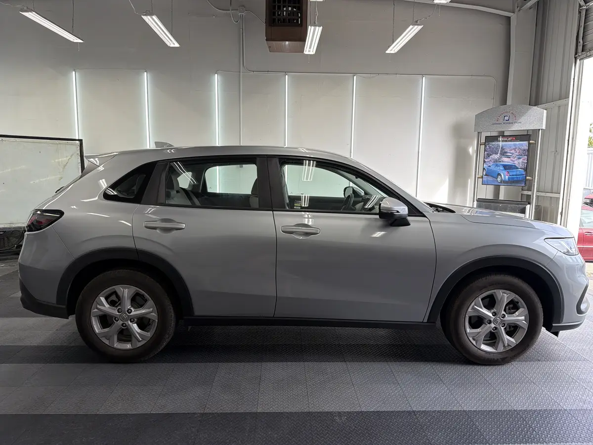 Silver Honda HR-V before window tinting, factory glass (view 2)