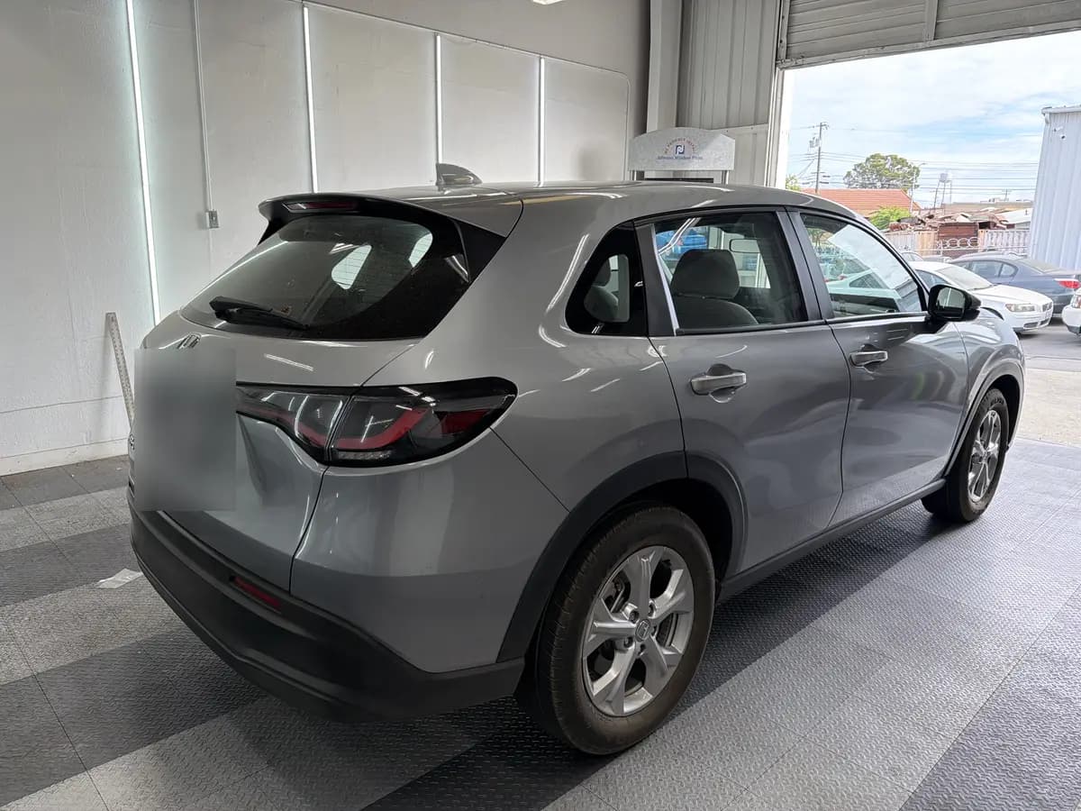 Silver Honda HR-V before window tinting, factory glass (view 3)