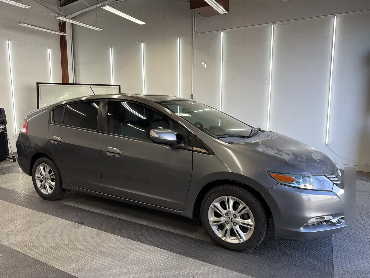 Gray Honda Insight after Avery Dennison Encore Supreme ceramic window tint (view 1)
