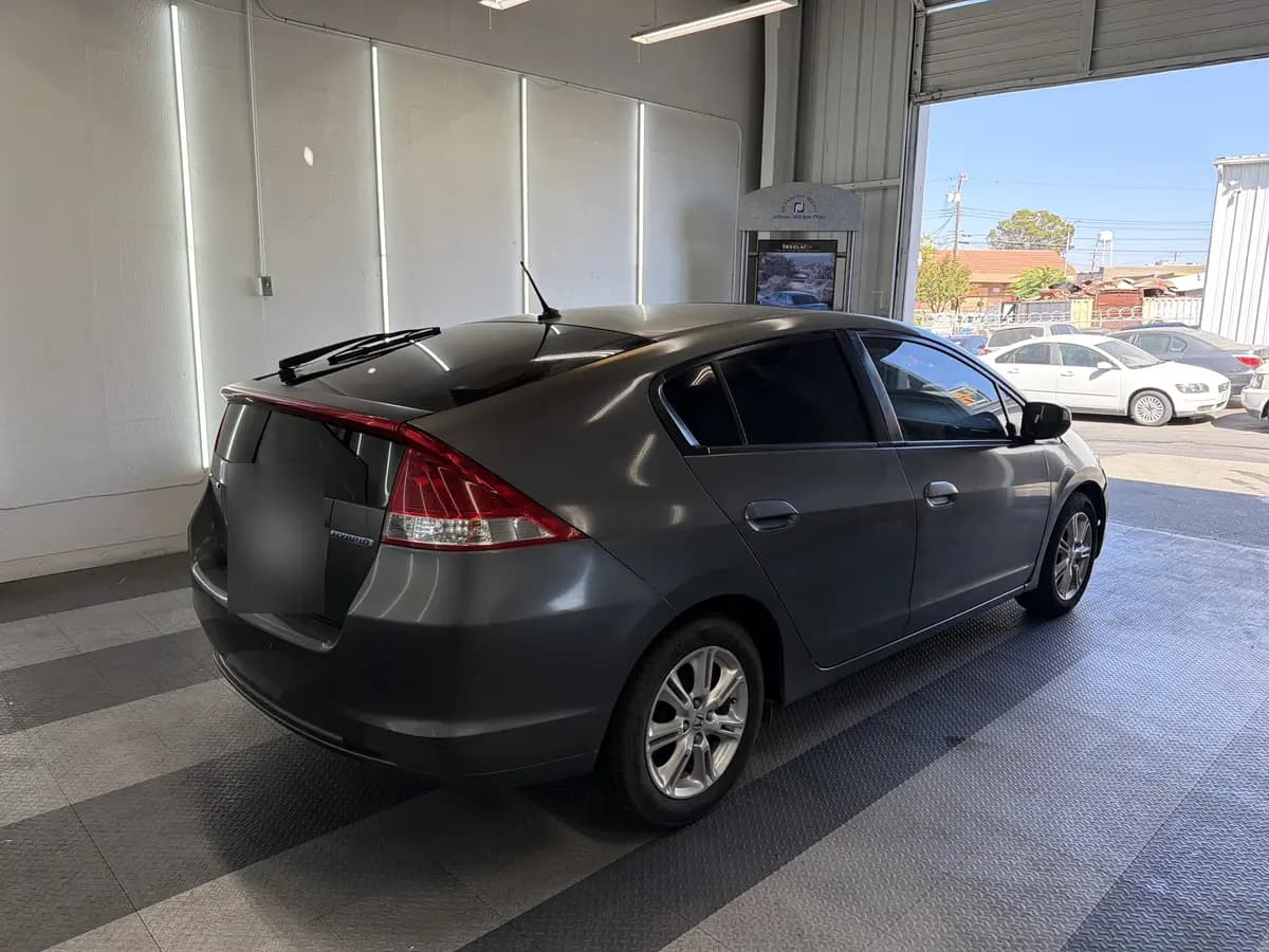 Gray Honda Insight after Avery Dennison Encore Supreme ceramic window tint (view 3)