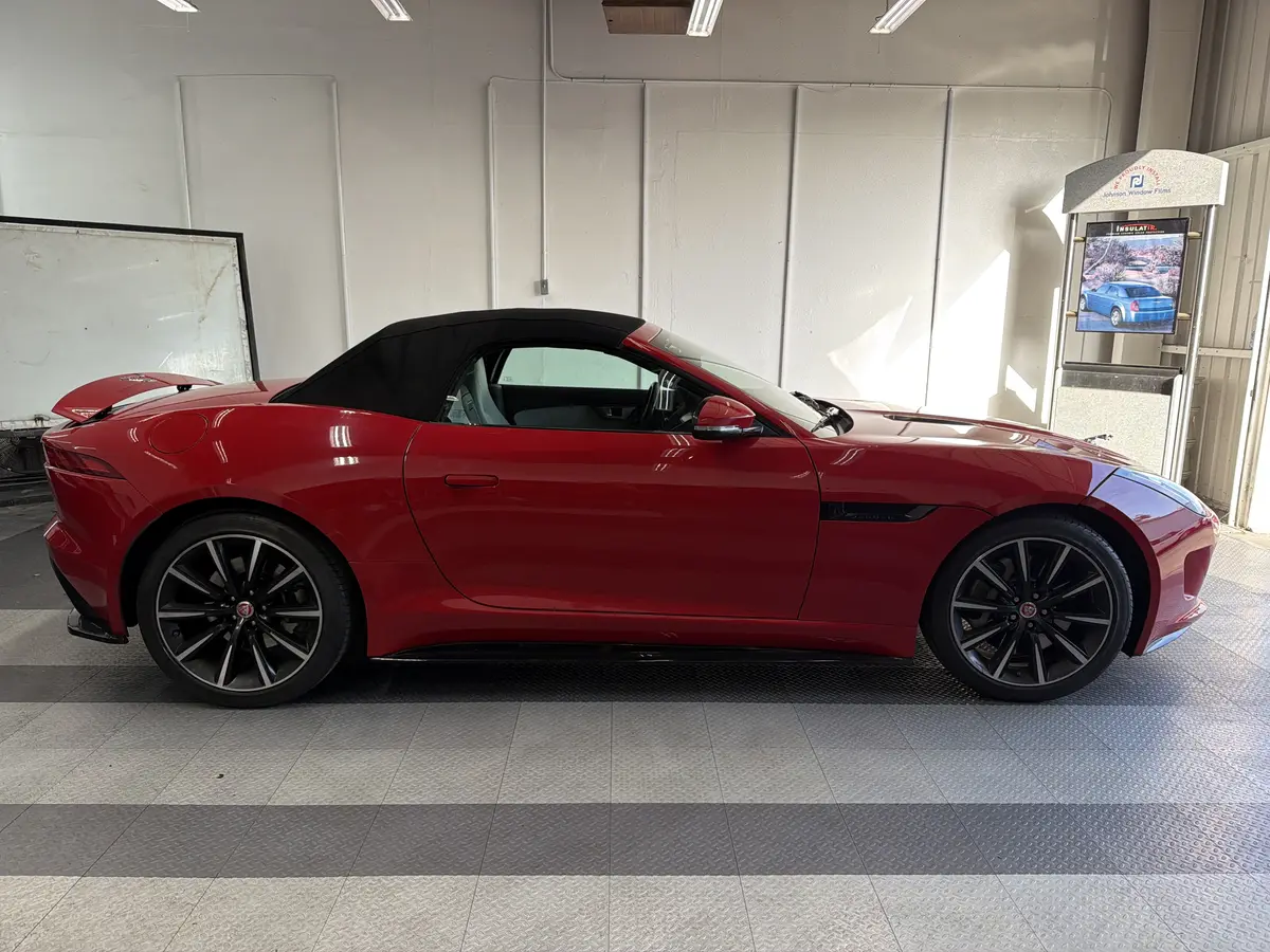 Red Jaguar F-Type before window tinting, factory glass (view 2)