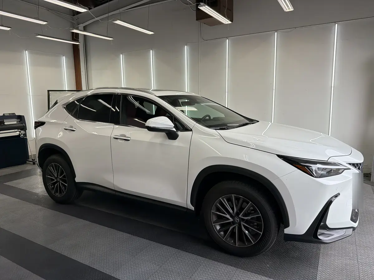 White Lexus NX before window tinting, factory glass (view 1)