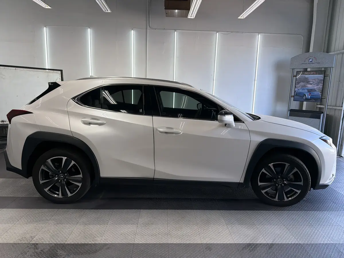 White Lexus UX after Avery Dennison Encore Supreme ceramic window tint (view 2)