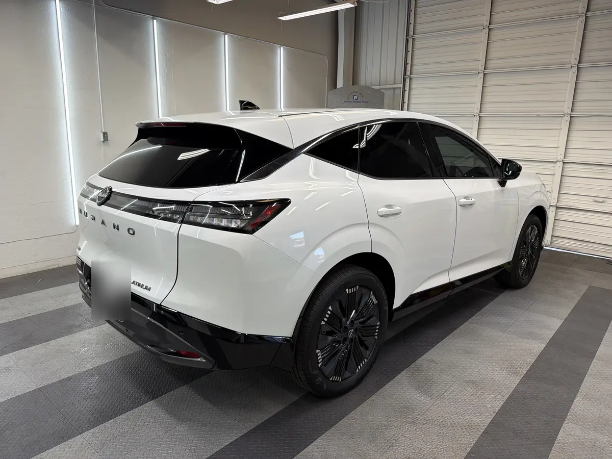 White Nissan Murano after Avery Dennison Encore Supreme ceramic window tint (view 3)